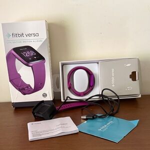 fitbit Versa Lite Edition Smartwatch - Purple Band with Black Charger